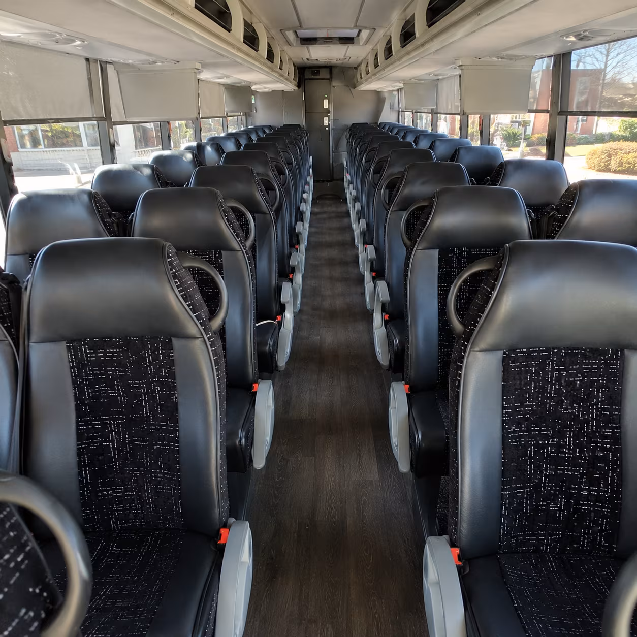 macon 54 passenger charter bus inside
